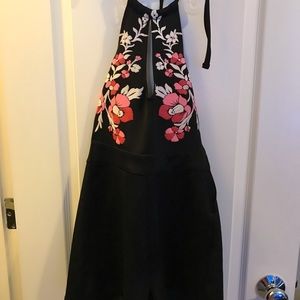 Flower print , short jumpsuit .